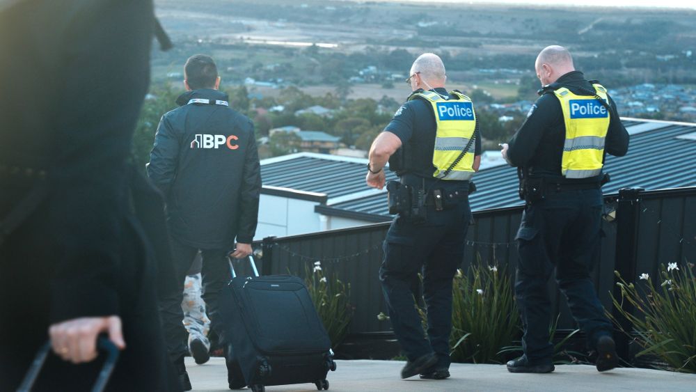 BPC representative with police raid Homespace Builds
