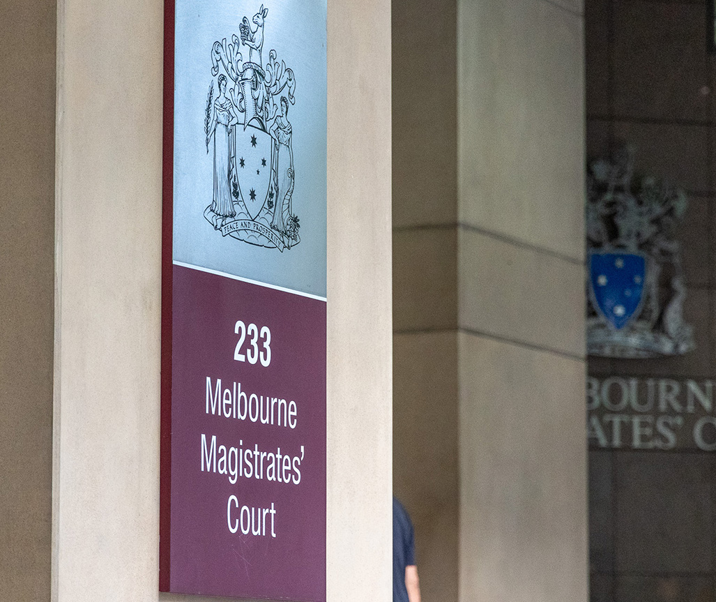 Picture of the sign outside at the front of the Melbourne Magistrate's Court building