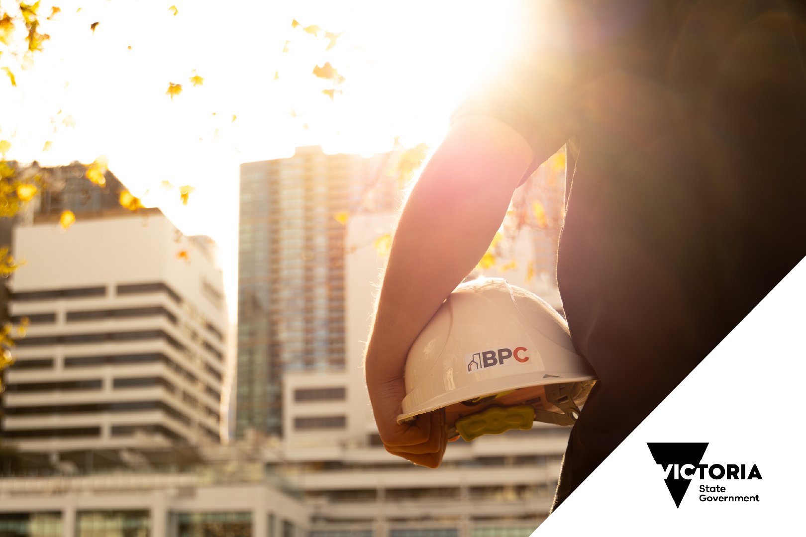Man with hard hat in sunlight
